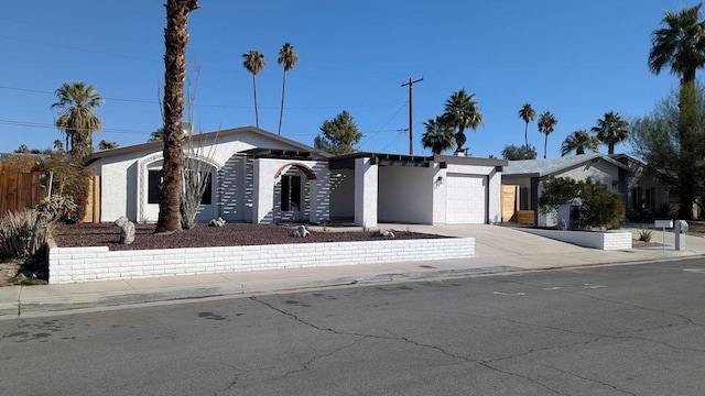 ranch-style home with a garage