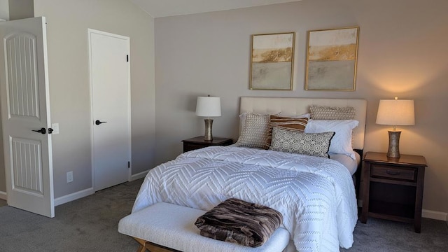 carpeted bedroom featuring vaulted ceiling