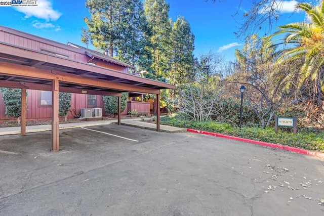 view of parking with a carport