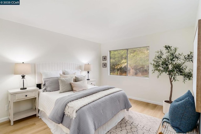 bedroom featuring light hardwood / wood-style floors