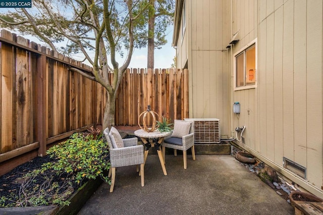 view of patio with cooling unit