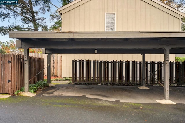 exterior space with a carport