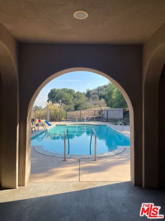 view of pool with a patio area