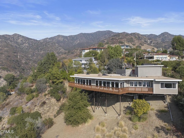 exterior space featuring a mountain view