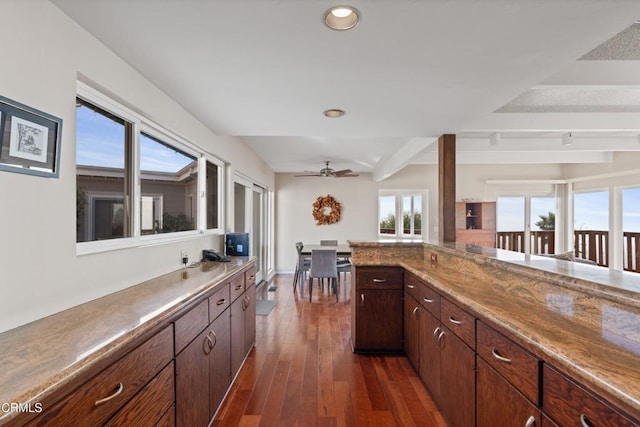 kitchen with recessed lighting, dark wood finished floors, ceiling fan, and light countertops