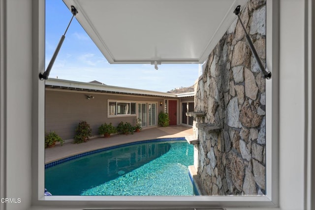 pool featuring a patio