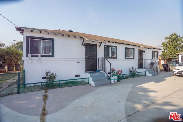 view of front of property with a patio