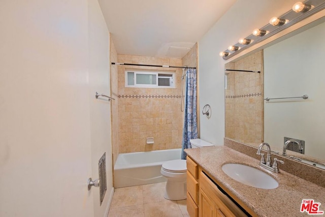 full bathroom featuring vanity, tile patterned floors, shower / bath combination with curtain, and toilet