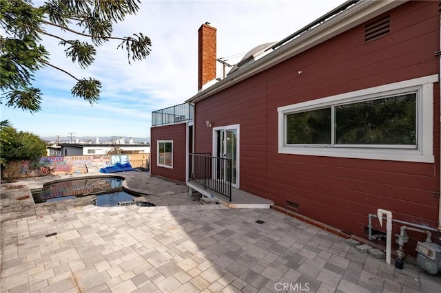 view of home's exterior featuring a patio area