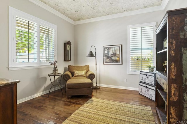 sitting room featuring ornamental molding, dark wood-style flooring, an ornate ceiling, and baseboards