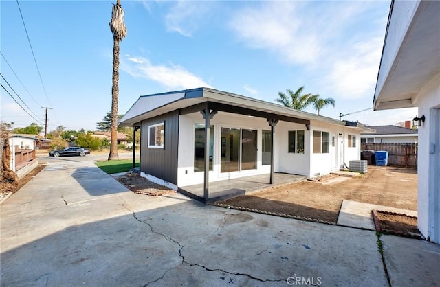 back of house with a patio area