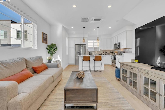 living room featuring light hardwood / wood-style flooring