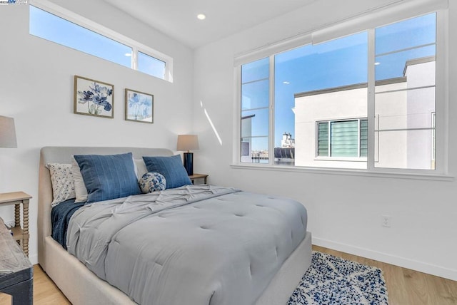 bedroom featuring light hardwood / wood-style floors