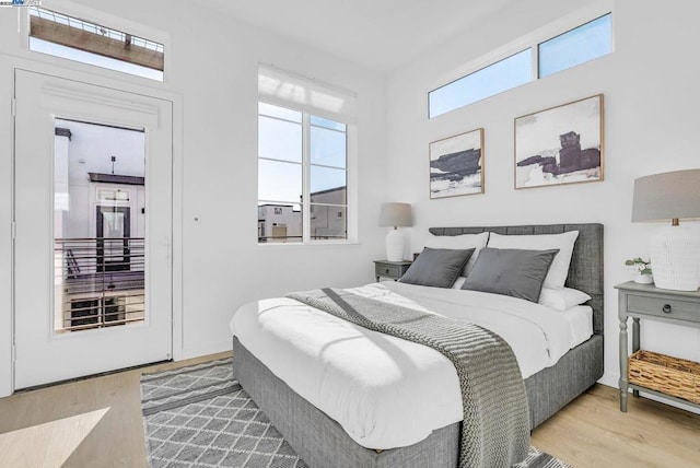 bedroom with wood-type flooring