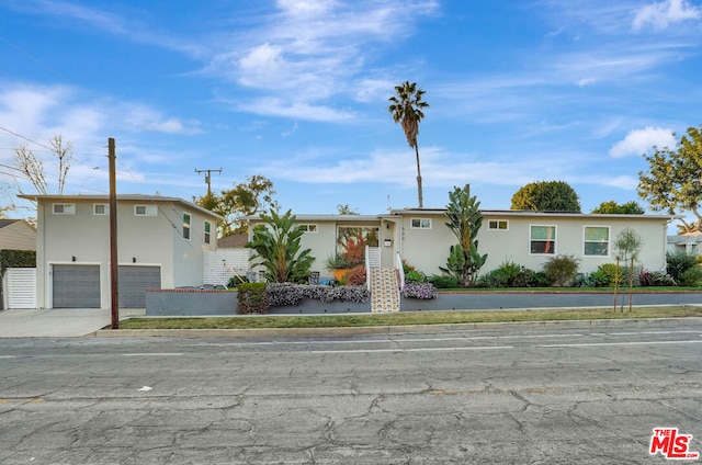 view of front of home featuring a garage