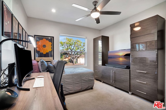 bedroom with light carpet and ceiling fan