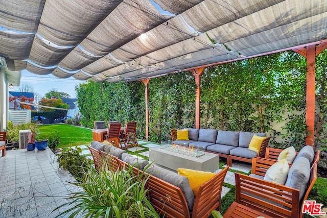 view of patio / terrace featuring a pergola and an outdoor living space with a fire pit