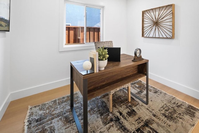 office area with hardwood / wood-style floors