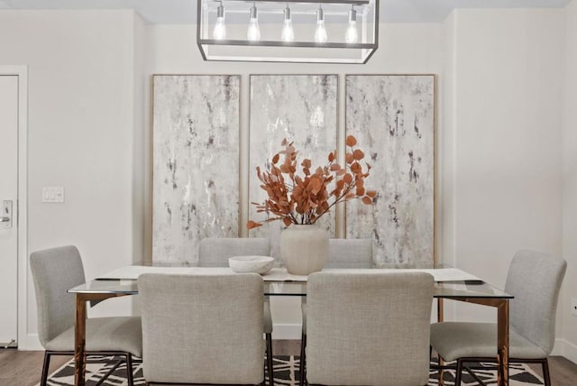 dining room featuring wood-type flooring