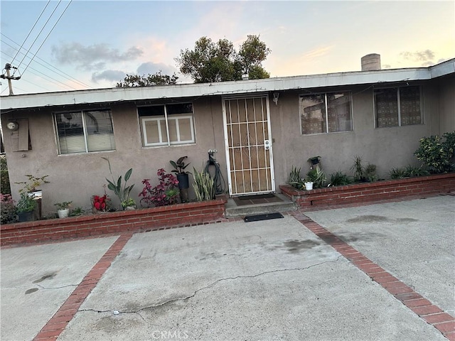 view of front of property with a patio area