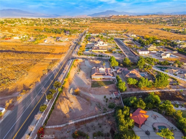 drone / aerial view with a residential view and a mountain view