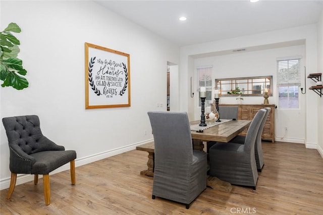 dining room with baseboards, recessed lighting, visible vents, and light wood-type flooring