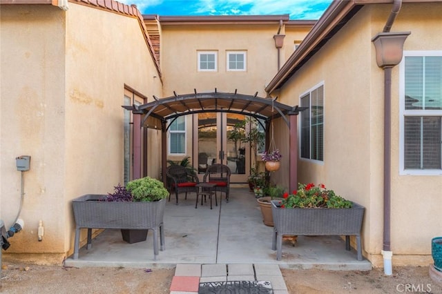 view of patio / terrace featuring a pergola