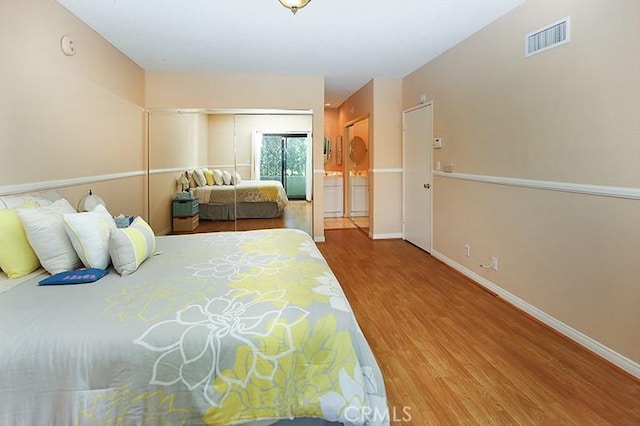 bedroom featuring wood-type flooring