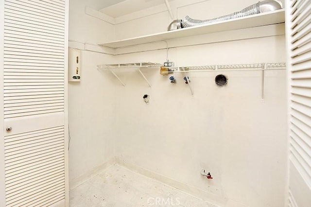 clothes washing area featuring laundry area