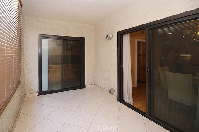 interior space featuring light tile patterned floors