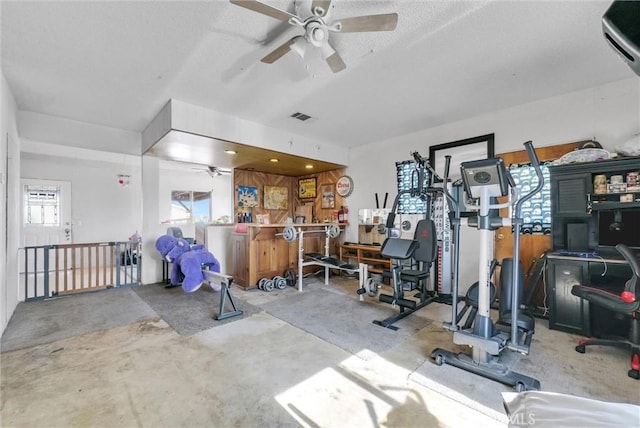 workout room featuring ceiling fan