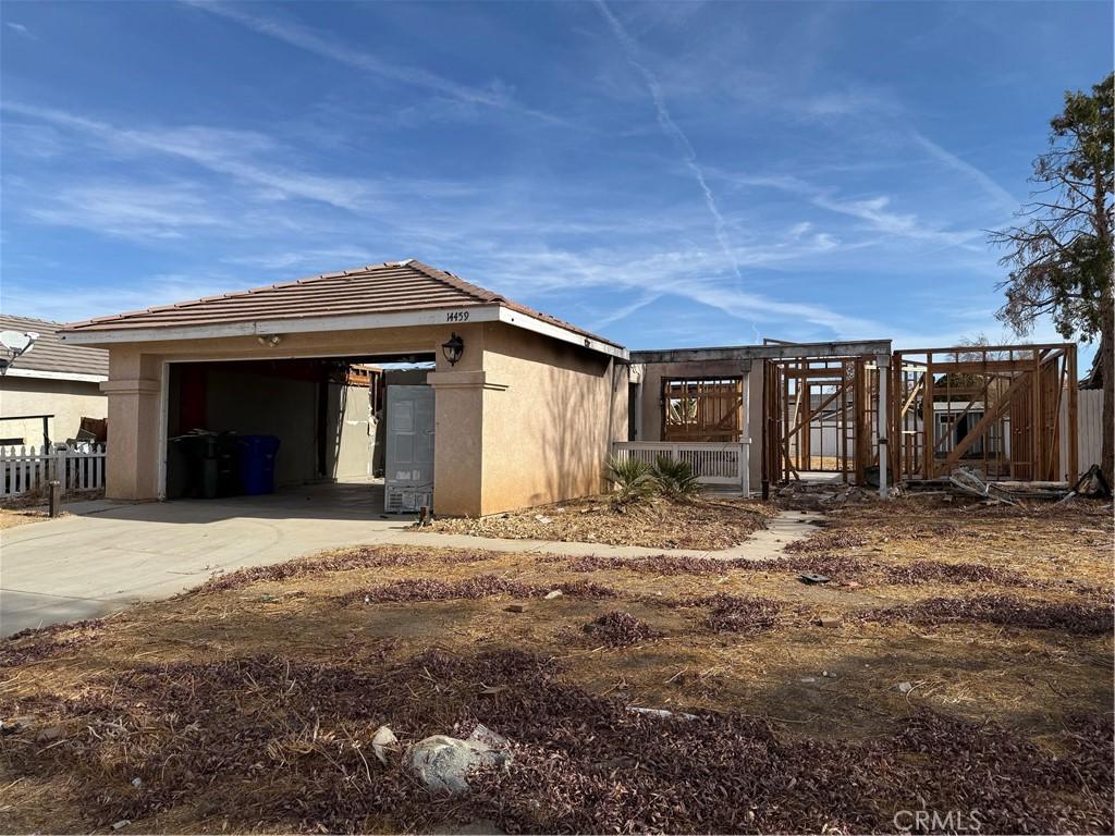 exterior space with a garage