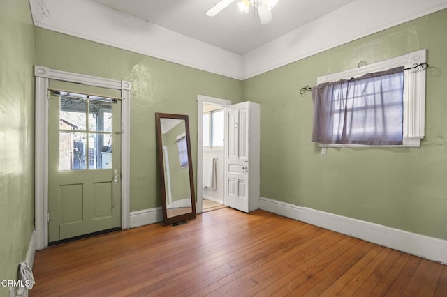 entryway with hardwood / wood-style floors and ceiling fan