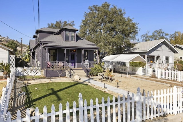 bungalow-style home with a front yard and covered porch