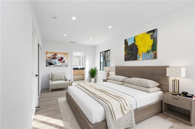 bedroom featuring light hardwood / wood-style flooring