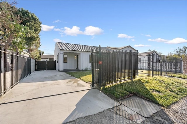 exterior space with a front lawn