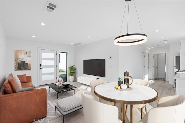 living room featuring light wood-type flooring