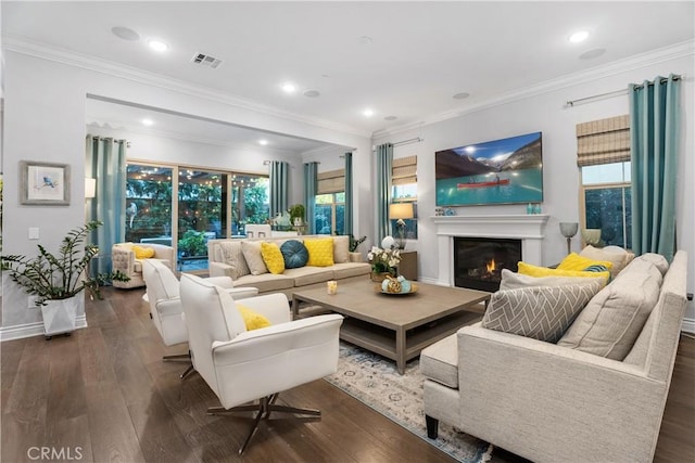 living room with crown molding and dark hardwood / wood-style flooring