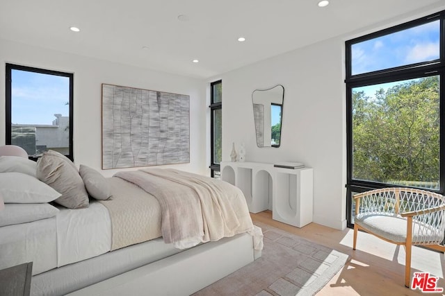 bedroom featuring light hardwood / wood-style floors