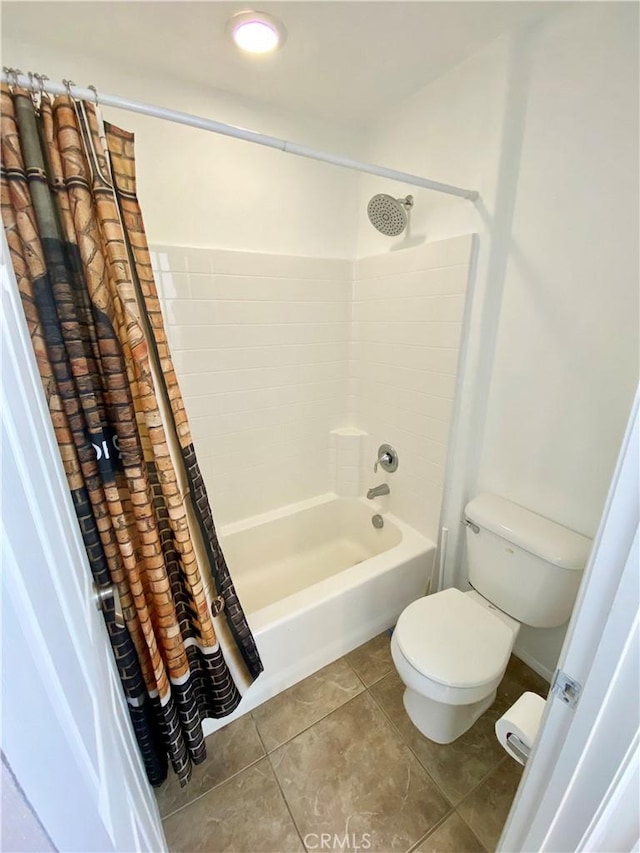 bathroom featuring toilet, tile patterned floors, and shower / bathtub combination with curtain