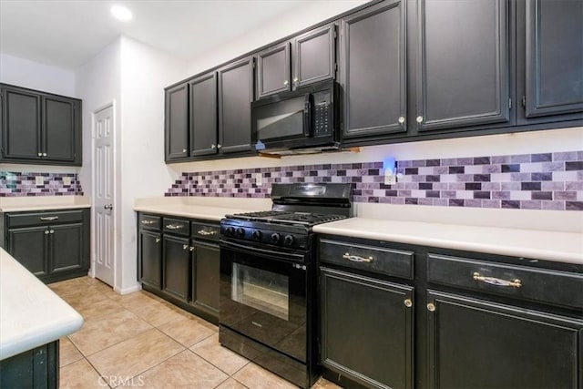 kitchen with black appliances, light tile patterned floors, decorative backsplash, and light countertops