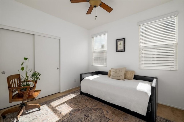 bedroom featuring a closet and ceiling fan