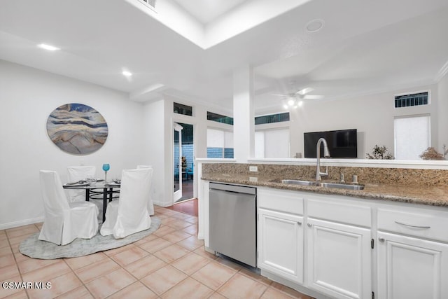 kitchen with white cabinetry, sink, dishwasher, and stone counters