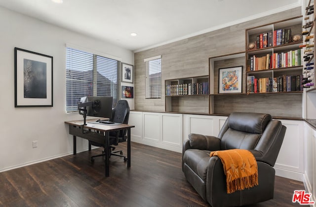 office space with dark hardwood / wood-style flooring and crown molding