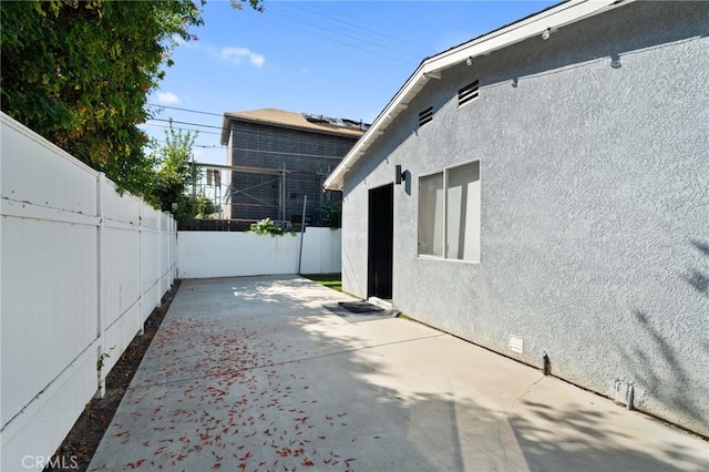 view of home's exterior with a patio area