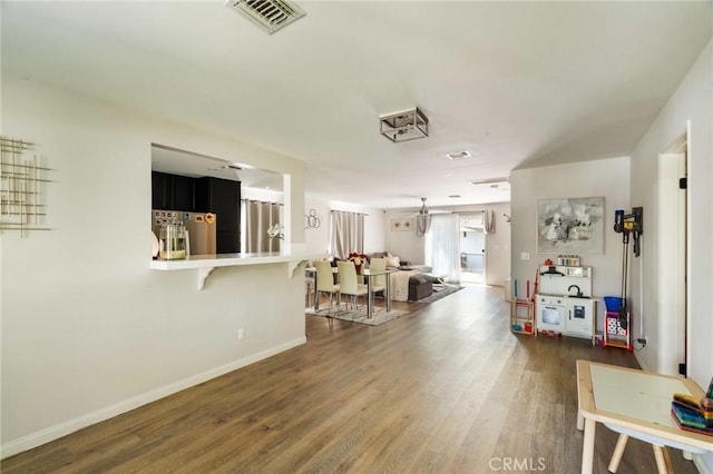 living room featuring dark hardwood / wood-style flooring