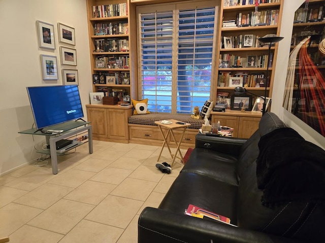 sitting room with light tile patterned flooring