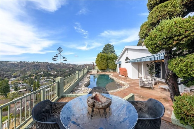 view of pool with a patio