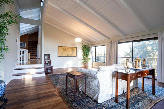 living room with hardwood / wood-style floors, high vaulted ceiling, and beamed ceiling