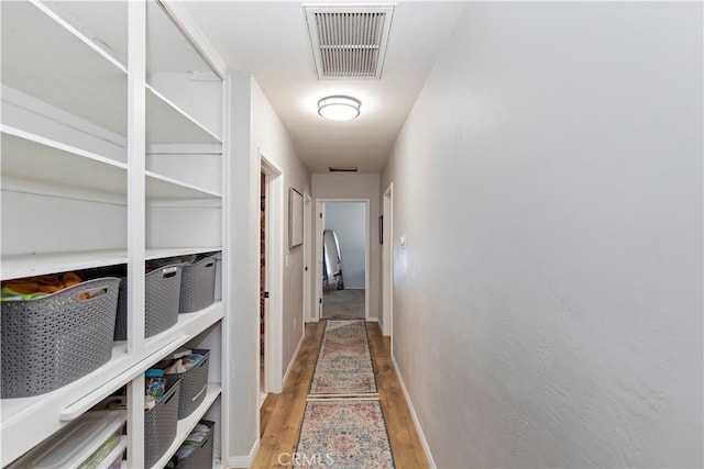 hallway featuring light hardwood / wood-style floors